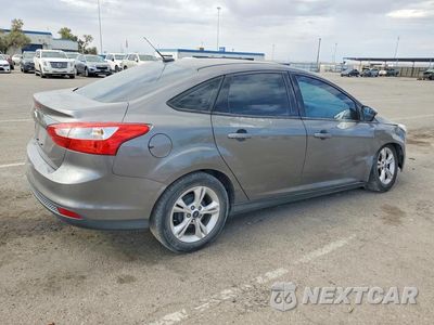 Trzecie zdjęcie samochodu z tyłu: 2014 FORD FOCUS SE VIN:1FADP3F29EL249349 - miniatura