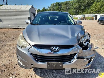 Piąte zdjęcie samochodu w środku: 2011 HYUNDAI TUCSON LIMITED VIN:KM8JU3AC9BU187958 - miniatura