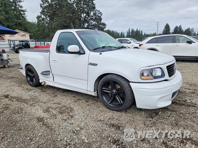 Czwarte zdjęcie samochodu z boku: 2003 FORD F150 SVT LIGHTNING VIN:2FTRF07353CA82925 - miniatura