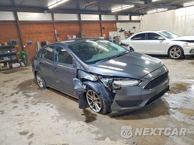 Czwarte zdjęcie samochodu z boku: 2018 FORD FOCUS SE VIN:1FADP3FE1JL301223 - miniatura