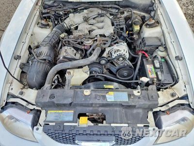 Zdjęcie 11 z 12 samochodu: 2001 FORD MUSTANG VIN:1FAFP444X1F214668 - miniatura