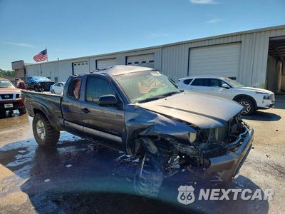 Czwarte zdjęcie samochodu z boku: 2014 TOYOTA TACOMA PRERUNNER ACCESS CAB VIN:5TFTU4GN3EX052392 - miniatura