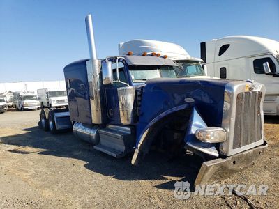 Czwarte zdjęcie samochodu z boku: 2019 PETERBILT 389 SEMI TRUCK VIN:1XPXD49X8KD630272 - miniatura