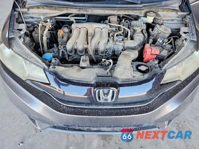 Zdjęcie 11 z 13 samochodu: 2016 HONDA FIT LX VIN:JHMGK5H57GX034734 - miniatura