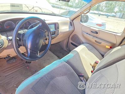 Zdjęcie 8 z 12 samochodu: 1999 FORD F150 VIN:1FTRX18W4XNB02528 - miniatura