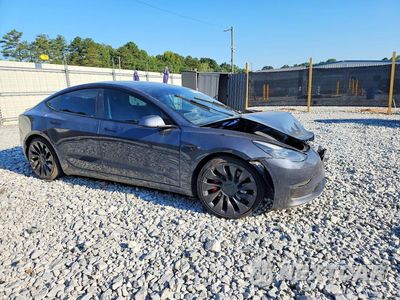 Czwarte zdjęcie samochodu z boku: 2022 TESLA MODEL 3 VIN:5YJ3E1EC7NF270519 - miniatura