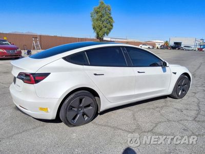 Trzecie zdjęcie samochodu z tyłu: 2021 TESLA MODEL 3 VIN:5YJ3E1EA1MF092300 - miniatura