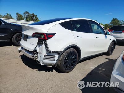Trzecie zdjęcie samochodu z tyłu: 2023 TESLA MODEL Y VIN:7SAYGDEE5PA055145 - miniatura