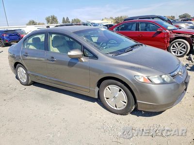 Czwarte zdjęcie samochodu z boku: 2007 HONDA CIVIC HYBRID VIN:JHMFA36267S025421 - miniatura