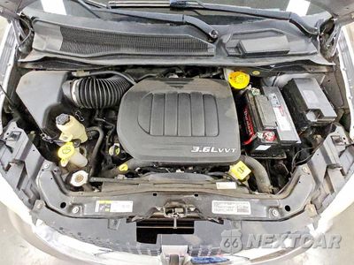 Zdjęcie 12 z 13 samochodu: 2014 DODGE GRAND CARAVAN SE VIN:2C4RDGBGXER194421 - miniatura