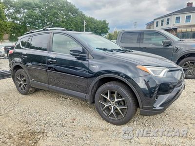 Czwarte zdjęcie samochodu z boku: 2017 TOYOTA RAV4 HV SE VIN:JTMJJREV0HD101165 - miniatura