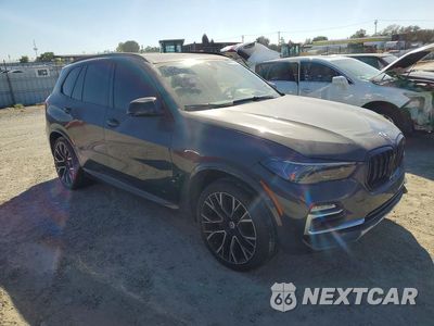 Czwarte zdjęcie samochodu z boku: 2022 BMW X5 M VIN:5YMJU0C0XN9M99646 - miniatura