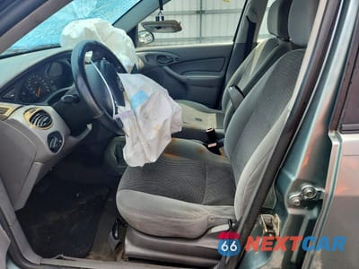 Zdjęcie 7 z 12 samochodu: 2003 FORD FOCUS SE VIN:1FAFP36383W213942 - miniatura