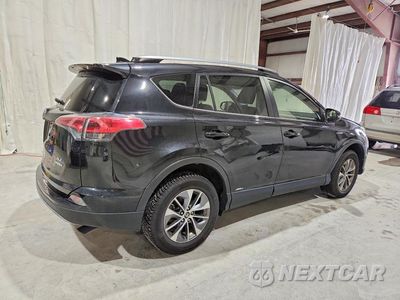Trzecie zdjęcie samochodu z tyłu: 2017 TOYOTA RAV4 HYBRID XLE VIN:JTMRJREVXHD069733 - miniatura