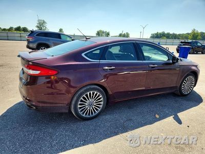 Trzecie zdjęcie samochodu z tyłu: 2017 FORD FUSION TITANIUM VIN:3FA6P0K91HR124796 - miniatura