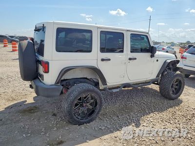 Trzecie zdjęcie samochodu z tyłu: 2012 JEEP WRANGLER UNLIMITED SPORT VIN:1C4HJWDG5CL101032 - miniatura