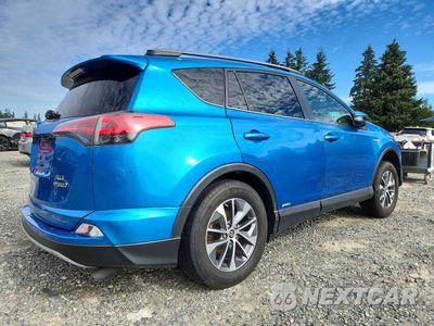 Trzecie zdjęcie samochodu z tyłu: 2017 TOYOTA RAV4 HYBRID XLE VIN:JTMRJREV1HD141130 - miniatura