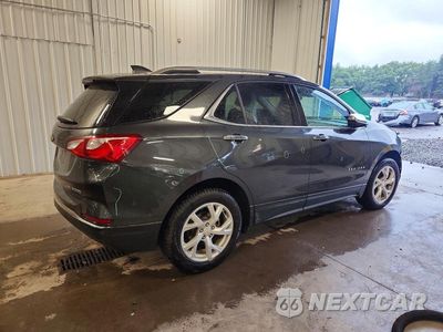 Trzecie zdjęcie samochodu z tyłu: 2018 CHEVROLET EQUINOX PREMIER VIN:2GNAXVEV4J6204947 - miniatura