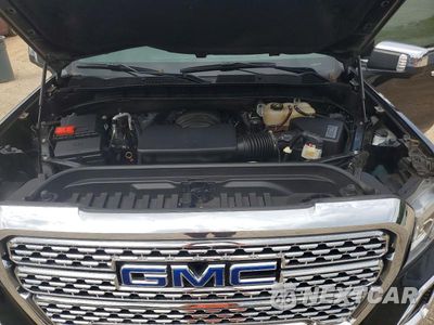 Zdjęcie 11 z 12 samochodu: 2020 GMC SIERRA K1500 DENALI VIN:3GTU9FED0LG356146 - miniatura