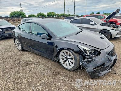 Czwarte zdjęcie samochodu z boku: 2023 TESLA MODEL 3 VIN:5YJ3E1EA4PF435444 - miniatura