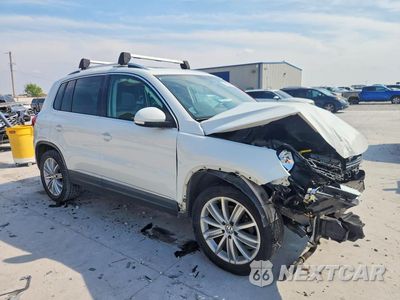 Czwarte zdjęcie samochodu z boku: 2015 VOLKSWAGEN TIGUAN S VIN:WVGBV7AX9FW580039 - miniatura