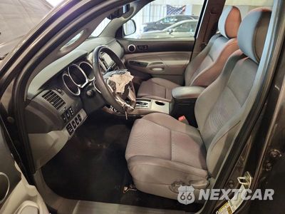 Zdjęcie 7 z 12 samochodu: 2013 TOYOTA TACOMA V6 VIN:3TMLU4EN4DM113045 - miniatura