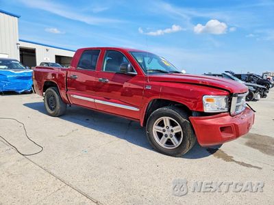 Czwarte zdjęcie samochodu z boku: 2010 DODGE DAKOTA LARAMIE VIN:1D7CE5GP6AS194608 - miniatura