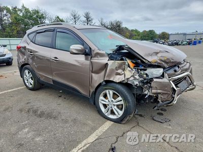 Czwarte zdjęcie samochodu z boku: 2013 HYUNDAI TUCSON GLS VIN:KM8JU3AC9DU656467 - miniatura
