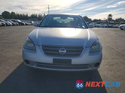 Piąte zdjęcie samochodu w środku: 2003 NISSAN ALTIMA 2.5 S VIN:1N4AL11E33C128768 - miniatura
