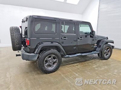 Trzecie zdjęcie samochodu z tyłu: 2013 JEEP WRANGLER UNLIMITED SAHARA VIN:1C4BJWEG7DL655792 - miniatura