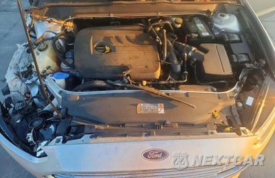 Zdjęcie 11 z 12 samochodu: 2014 FORD FUSION VIN:3FA6P0HD0ER128555 - miniatura