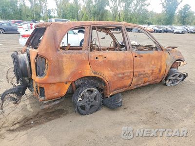 Trzecie zdjęcie samochodu z tyłu: 2003 TOYOTA RAV4 BASE VIN:JTEHH20V430227615 - miniatura