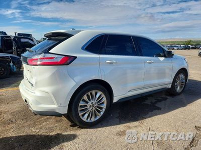 Trzecie zdjęcie samochodu z tyłu: 2020 FORD EDGE TITANIUM VIN:2FMPK4K95LBA12199 - miniatura