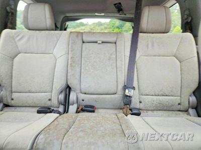 Zdjęcie 10 z 13 samochodu: 2013 HONDA PILOT EXL VIN:5FNYF4H5XDB039050 - miniatura