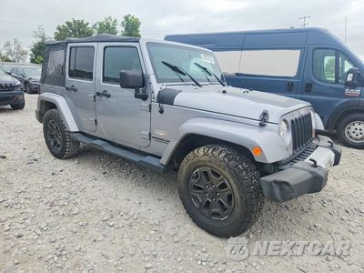 Czwarte zdjęcie samochodu z boku: 2013 JEEP WRANGLER UNLIMITED SAHARA VIN:1C4BJWEG7DL692843 - miniatura