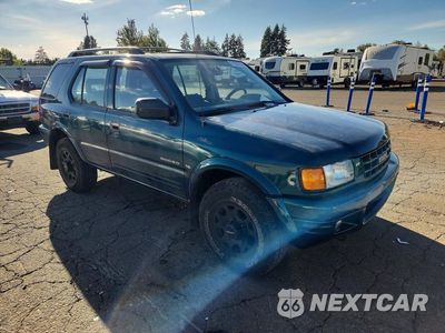 Czwarte zdjęcie samochodu z boku: 1998 ISUZU RODEO S VIN:4S2CM58W6W4339634 - miniatura