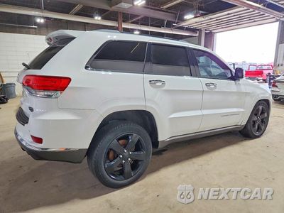 Trzecie zdjęcie samochodu z tyłu: 2014 JEEP GRAND CHEROKEE SUMMIT VIN:1C4RJFJT4EC124097 - miniatura