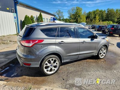 Trzecie zdjęcie samochodu z tyłu: 2014 FORD ESCAPE TITANIUM VIN:1FMCU0J9XEUB56041 - miniatura