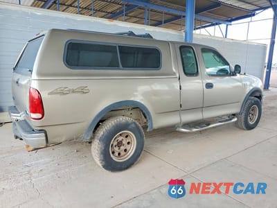 Trzecie zdjęcie samochodu z tyłu: 2002 FORD F150 VIN:1FTRX18W02NB83486 - miniatura