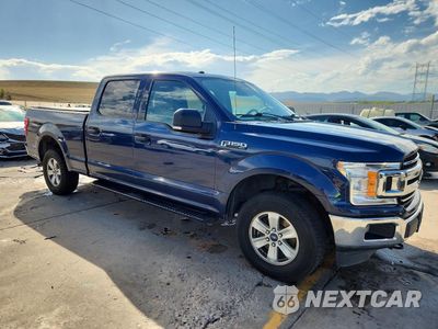 Czwarte zdjęcie samochodu z boku: 2018 FORD F150 SUPERCREW VIN:1FTFW1E56JFD71455 - miniatura