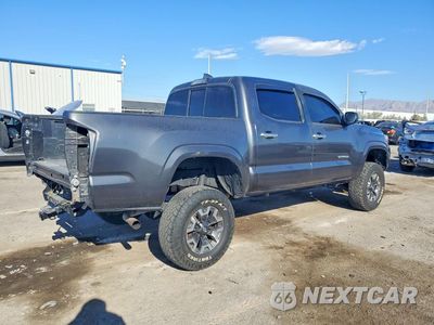 Trzecie zdjęcie samochodu z tyłu: 2019 TOYOTA TACOMA SR VIN:5TFAX5GN1KX161384 - miniatura