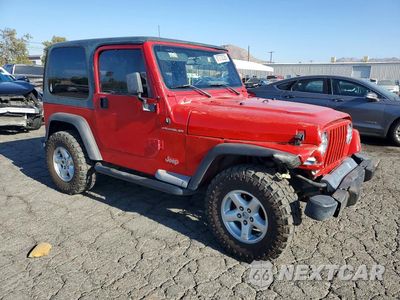 Czwarte zdjęcie samochodu z boku: 2000 JEEP WRANGLER / TJ SE VIN:1J4FA29P3YP709571 - miniatura