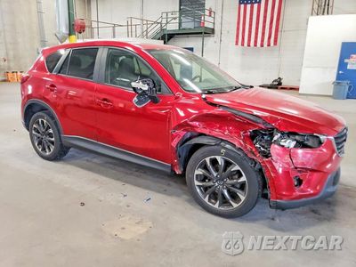 Czwarte zdjęcie samochodu z boku: 2016 MAZDA CX-5 GT VIN:JM3KE4DY1G0826035 - miniatura