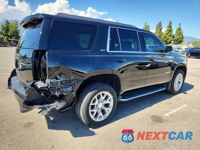 Trzecie zdjęcie samochodu z tyłu: 2019 GMC YUKON SLT VIN:1GKS1DKCXKR405774 - miniatura
