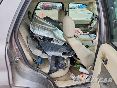 Zdjęcie 10 z 12 samochodu: 2009 MERCURY MARINER VIN:4M2CU81G39KJ09205 - miniatura