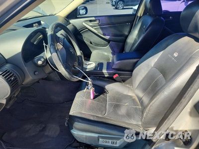 Zdjęcie 7 z 12 samochodu: 2004 INFINITI G35 BASE VIN:JNKCV51E24M601591 - miniatura