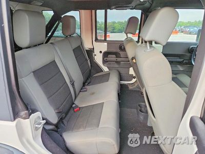 Zdjęcie 10 z 13 samochodu: 2010 JEEP WRANGLER UNLIMITED SPORT VIN:1J4BA3H19AL105022 - miniatura