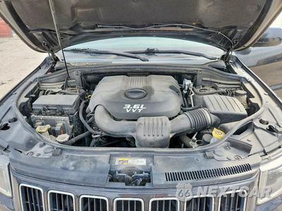 Zdjęcie 12 z 14 samochodu: 2014 JEEP GRAND CHEROKE VIN:1C4RJFAG9EC163819 - miniatura