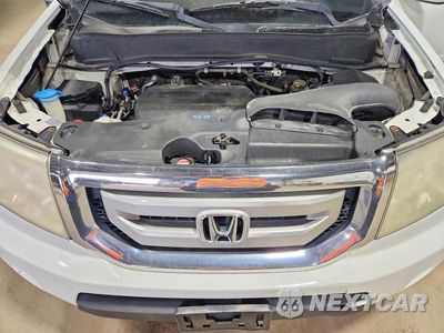 Zdjęcie 12 z 13 samochodu: 2011 HONDA PILOT EXL VIN:5FNYF4H56BB049961 - miniatura