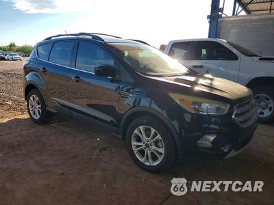 Czwarte zdjęcie samochodu z boku: 2018 FORD ESCAPE SE VIN:1FMCU0GD9JUB44470 - miniatura